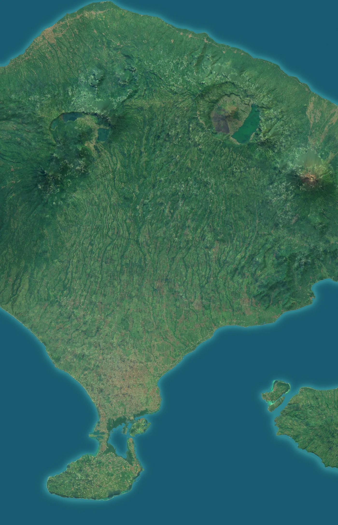 A satellite view of central Bali, green from coast to coast. A route runs from Sekumpul in the north, past Mount Batur, Ubud and Canggu, to Uluwatu on the southern tip.