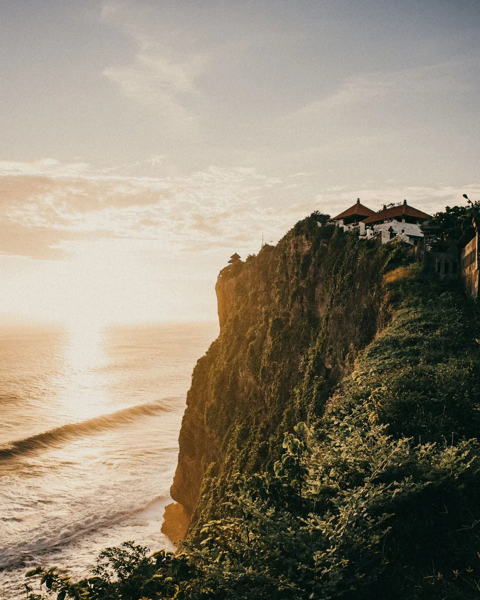 The cliffs at Uluwatu in the evening light, with the temple on the edge above the sea
